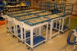 ACSI egyedi gyártásközi anyagmozgató- és tárolóeszközök ill. berendezések a Schneider Electric Zrt. gyárában