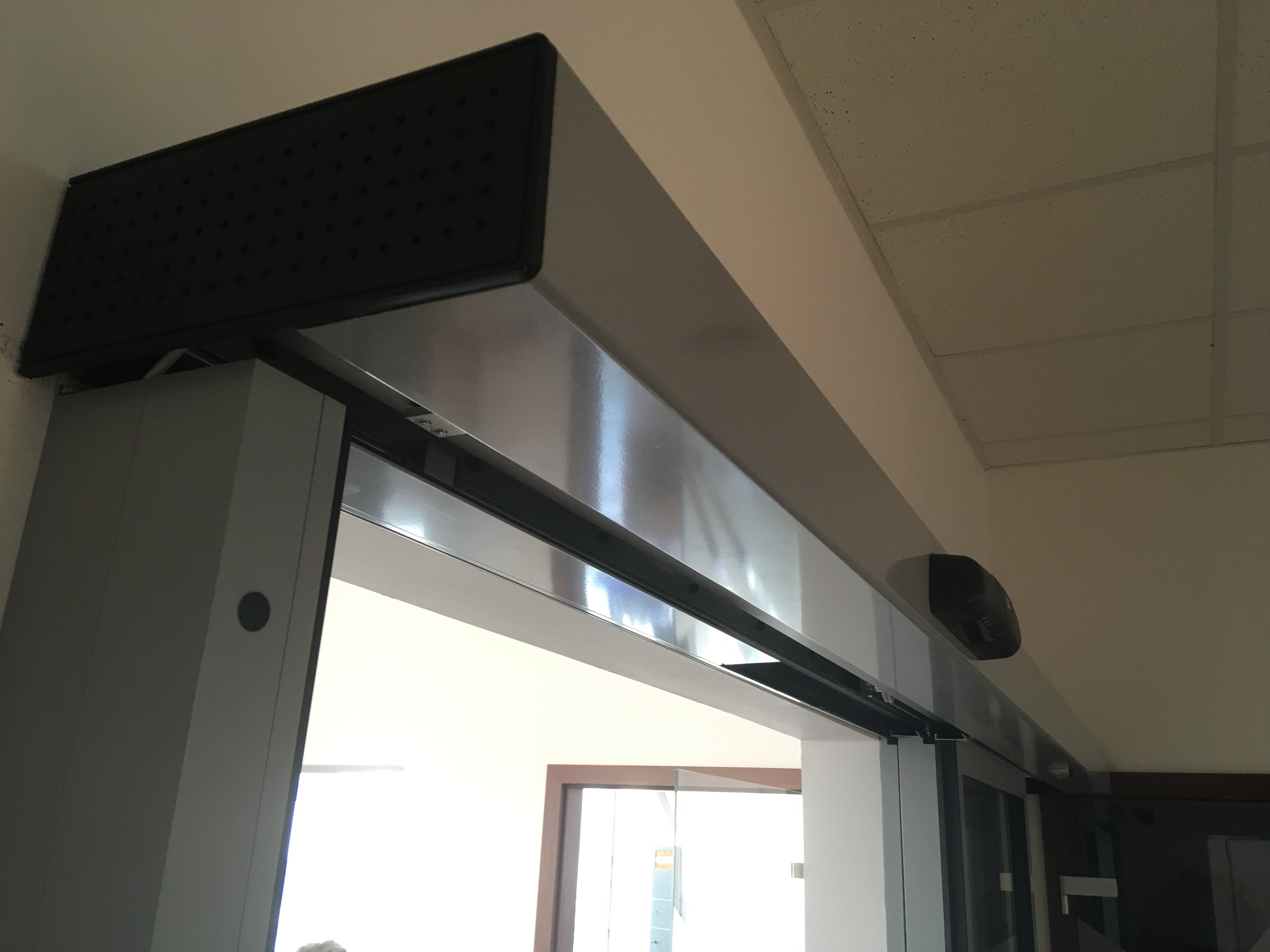 TST FLEX automata tolóajtó